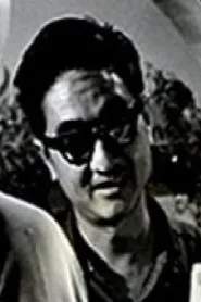 薛群