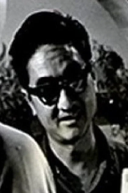 薛群