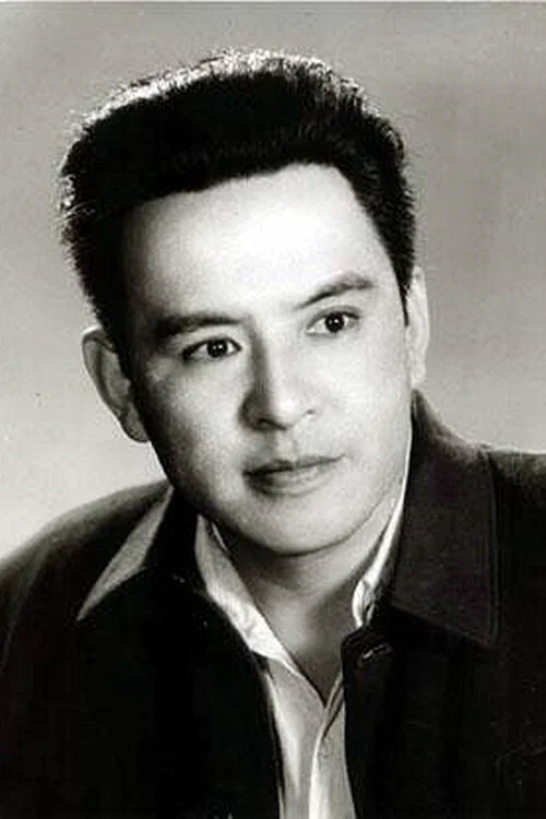 李默然