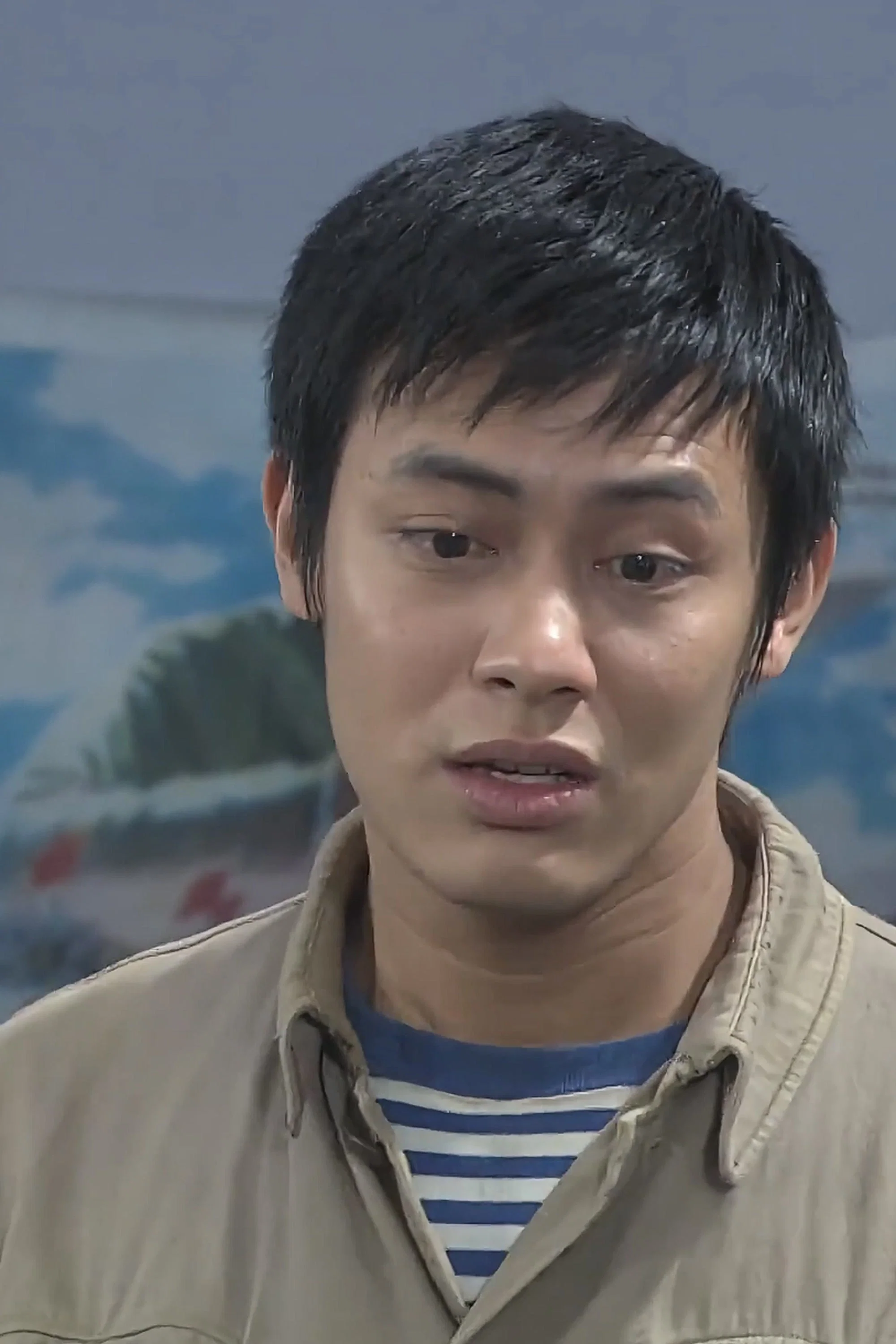 江健